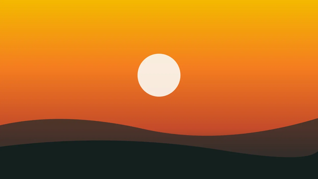 Warm sunset over the Caribbean coast with palm trees in silhouette